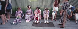 Tokyo heatwave. Tourists queue for beef cutlets