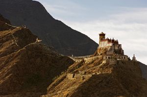 Yumbulagang Palace is in the Yarlung Valley region of Tibet. It's genereally considered the oldest building in Tibet with foundations probably laid over 2,000 years ago. It sits high on a ridge and can only be reached by way of a steep path on foot ot horseback. It was originally a fortress, but now is a temple attended by a few monks.  © Forest McMullin