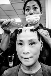 Pinning back of actors Hair