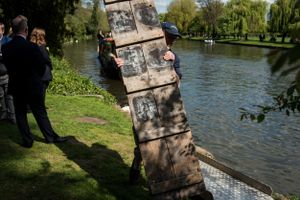 A walkway is used to get members of the parade onto a canalboat heading to the Shakespeare Birthday Celebration Lunch at the Crown Plaza.
