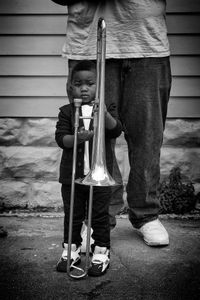 Small Boy with Large Horn