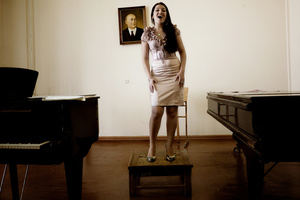 An Armenian pop singer rehearses at the National Conservatory of Tashkent.