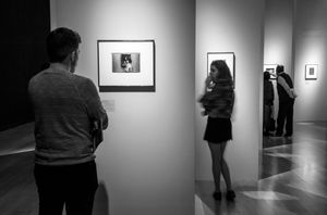 Lady in front of a portrait (tribute to Diane Arbus)