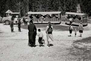 People approach the tourist train