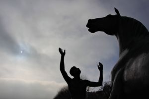 Atmospheric Sky and Statue Composition