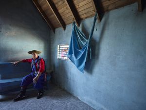 Gauchito Gil devotee at rest,  in the temple of the popular saint in El Campito de la Carolina