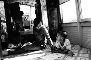 A family moment on a river boat. Vietnam