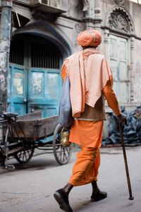 Hindu priest walks the streets of Old Delhi