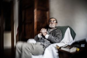 The waiting. During an attack of headache, Mere's father is unable to give any support and can only wait in a another room until the attack slowly fades.  Pain is so intense that Mere pretends to be left alone, sheltered in her room away from light. © Riccardo Budini / UnFrame