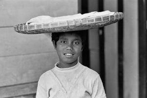 Young bread seller, Ruteng, 1973