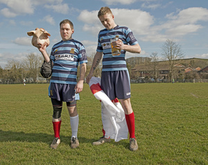 Tom Breakell and Craig Dixan from Shrewsbury RUFC with mascot 'Babe'.  Crediton Rugby Club match