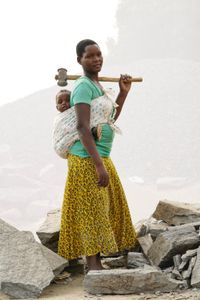 A. Innocent: Age 19  &  her son Michael : Age 14 months. Working in quarry for one year.
