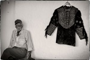 Black Indian Shell Suit | Narrie made this costume from chip chip seashells he collected on the beach. He would often reuse the shells and rearrange them differently to create new costumes.