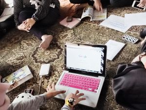 The editorial staff of Hijabella magazine works on the new issue.