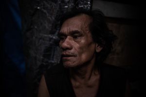 Into The Dark: Scenes From South East Asia's Meth Epidemic. An addict in his home in a slum, Manila, Philippines.