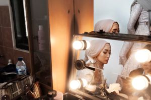 Model getting ready during a photo shoot.
