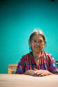 Maria's  husband died more than a decade ago and since then she has lived alone. She lives without a shower, sink, table or chairs. Her floor is the dirt and she waits for neighbor child to bring her a barrel of water per week. Her son lives nearby but his family is too poor to support Maria. She tries to visit her son everyday so he knows his mother  is ok and alive.