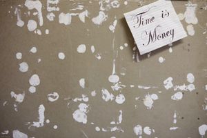 Time is money. All that is left on the prisoners notice board. Prisoners use toothpaste to stick items to the notice board as bluetack or pins are not allowed. Young Offenders Institution, Ayelsbury, United Kingdom.