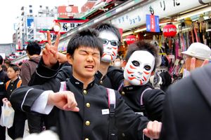 Schoolboys enjoying a Sunday outing to the Senso-Ji temple, Tokyo.