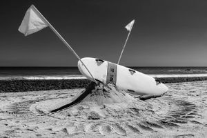 Surfboard and flags | Malibu state beach, Los Angeles, California.
