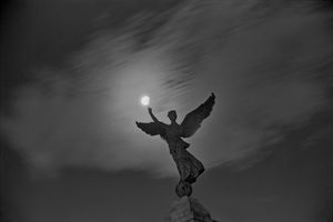 Angel with Moon in Eclipse
