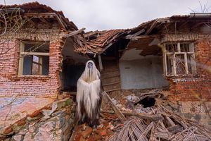 In front of the house